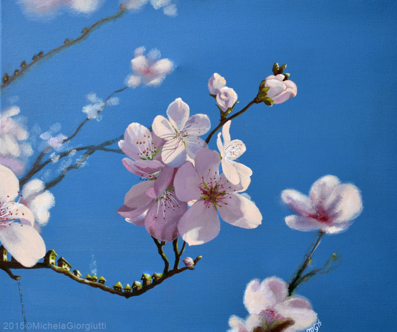 Villaggio posato su un ramo di pesco